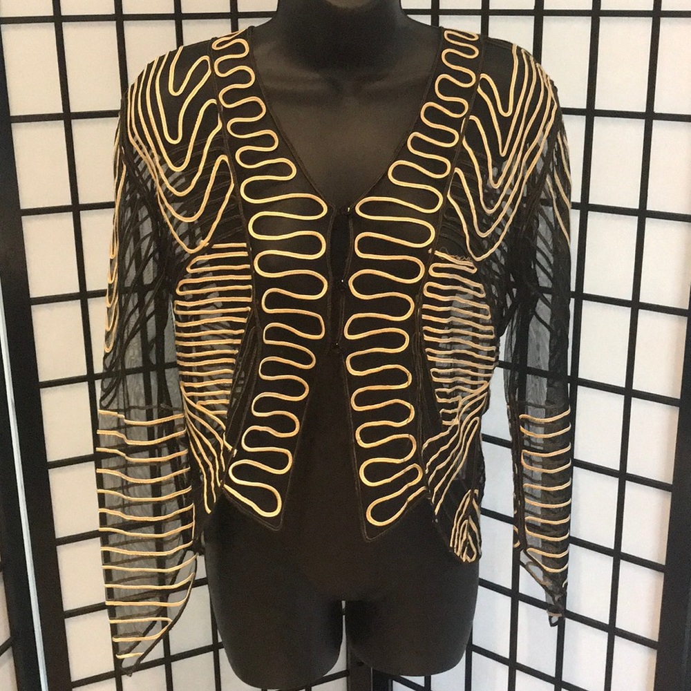 A black, gold and brown blazer